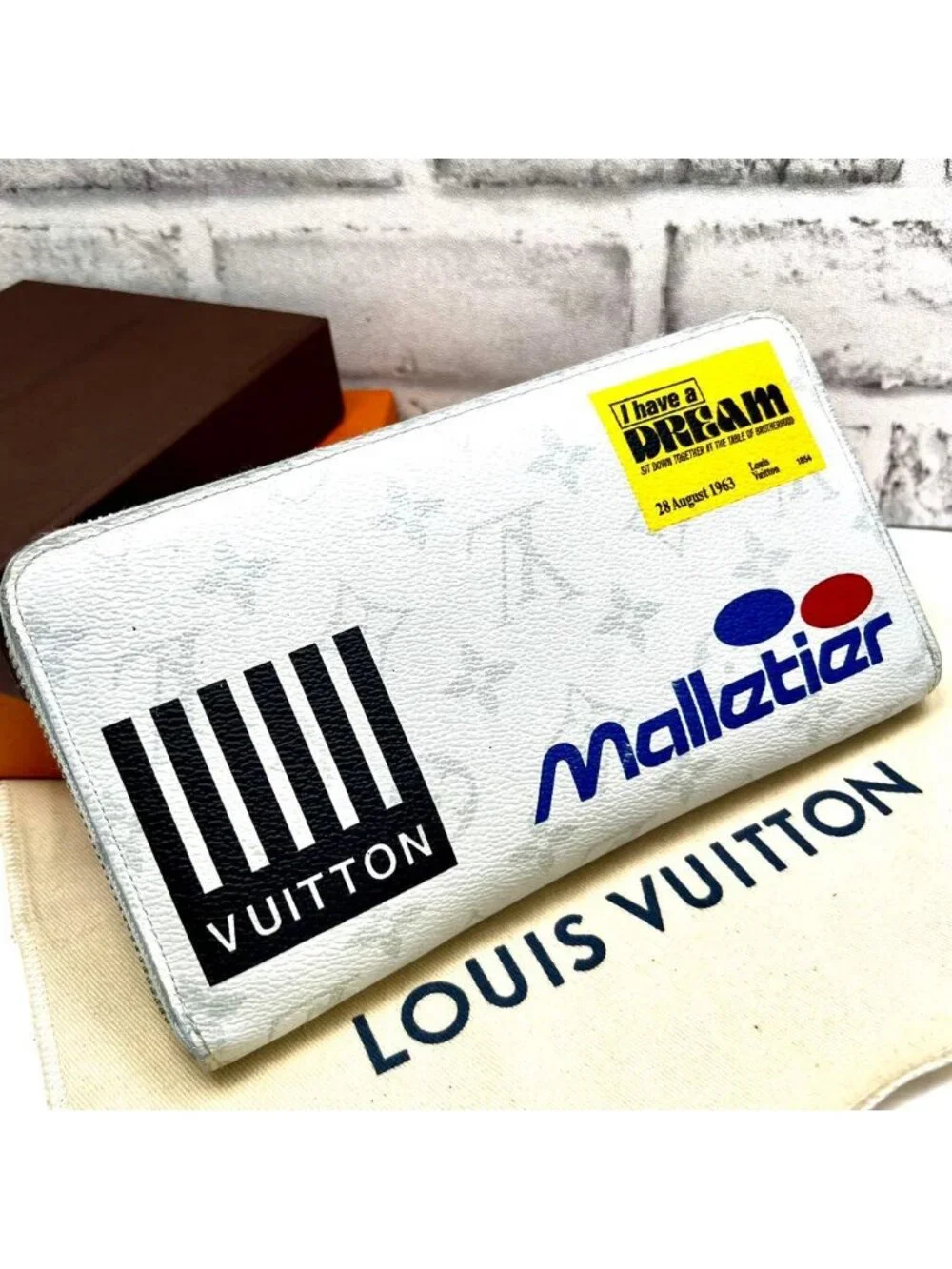Louis Vuitton Logo Story Zippy Organizer Wallet